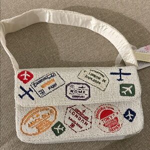 Vital Passport Stamped Beaded Bag